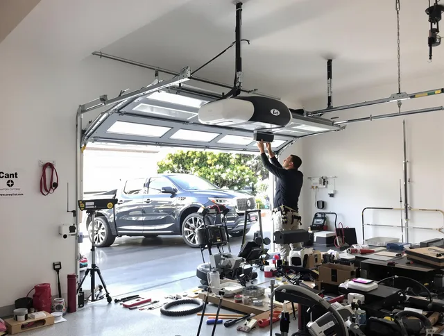 Bexley Garage Door Repair specialist installing smart garage door opener system in Bexley home